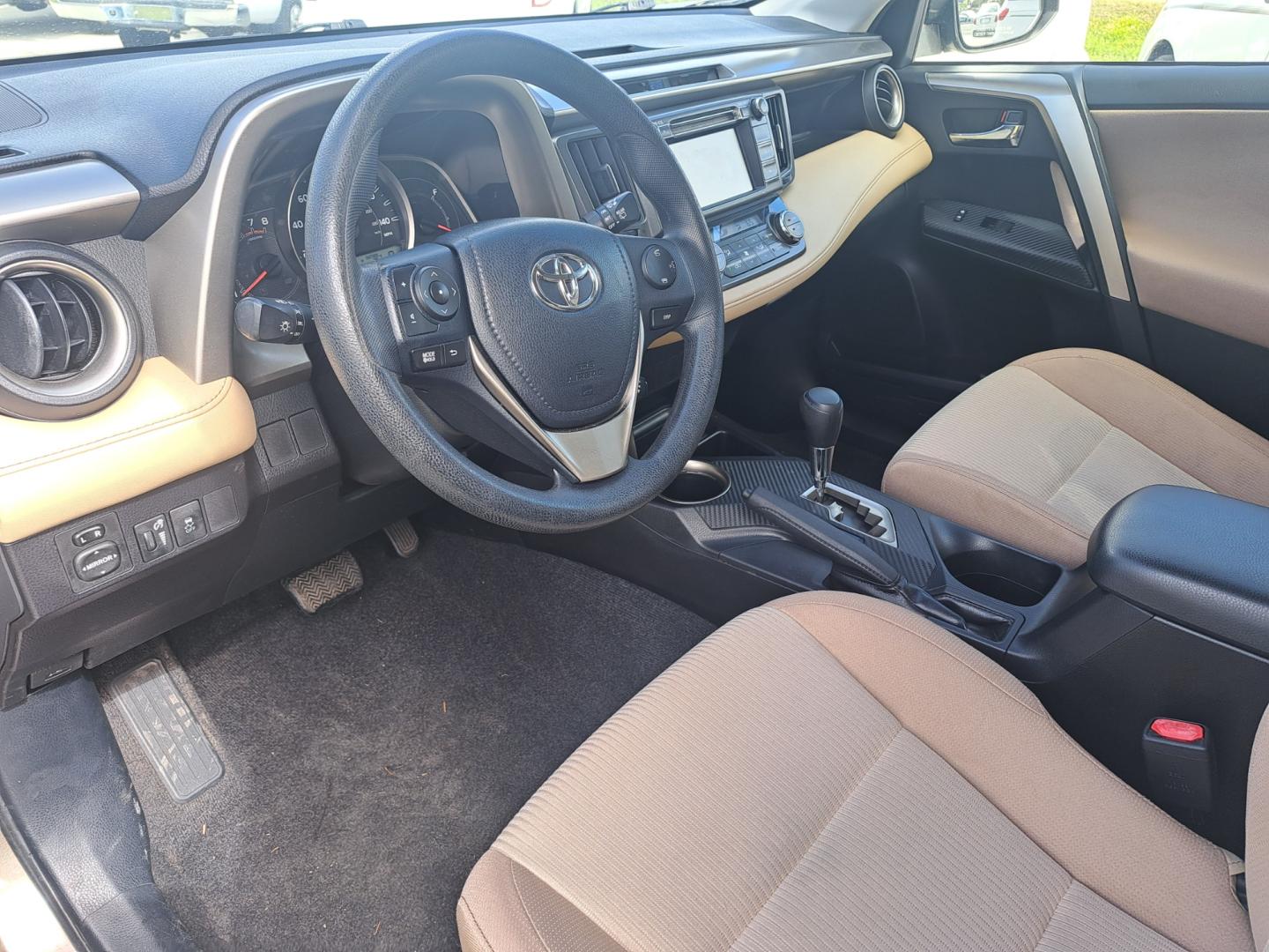 2015 BROWN Toyota RAV4 (JTMWFREV8FD) , AUTOMATIC transmission, located at 1181 Aurora Rd, Melbourne, FL, 32935, (321) 241-1100, 28.132914, -80.639175 - Photo#3